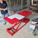 BÀN NÂNG XE MÁY ĐIỆN & ĐẠP CHÂN MINH THẮNG MT2 - ĐẶT DƯƠNG NỀN (BÀN NÂNG CƠ ĐIỆN)